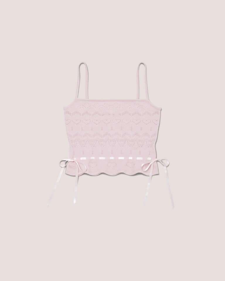 Cashmere Heart Knit Camisole in Pink, featuring thin straps, scalloped hem, and ribbon ties at the waist.