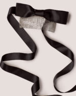 Satin Bow Hair Comb featuring a large satin bow and long ribbon tails, shown on a light background.