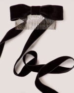 Velvet Bow Hair Comb featuring long black ribbon tails, displayed on a light background.